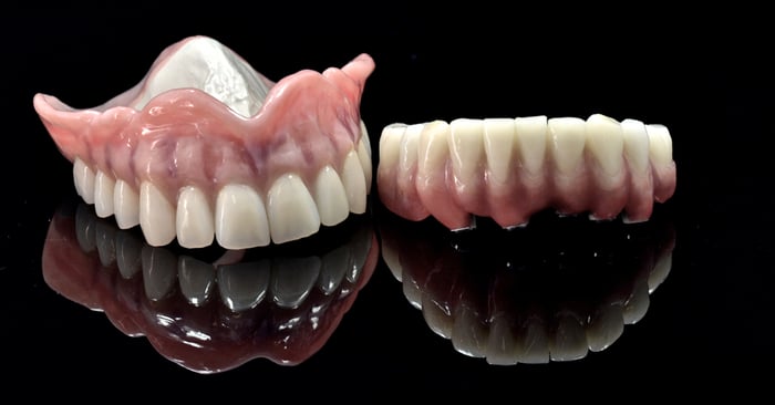 Customizing the white and pink esthetics of dentures